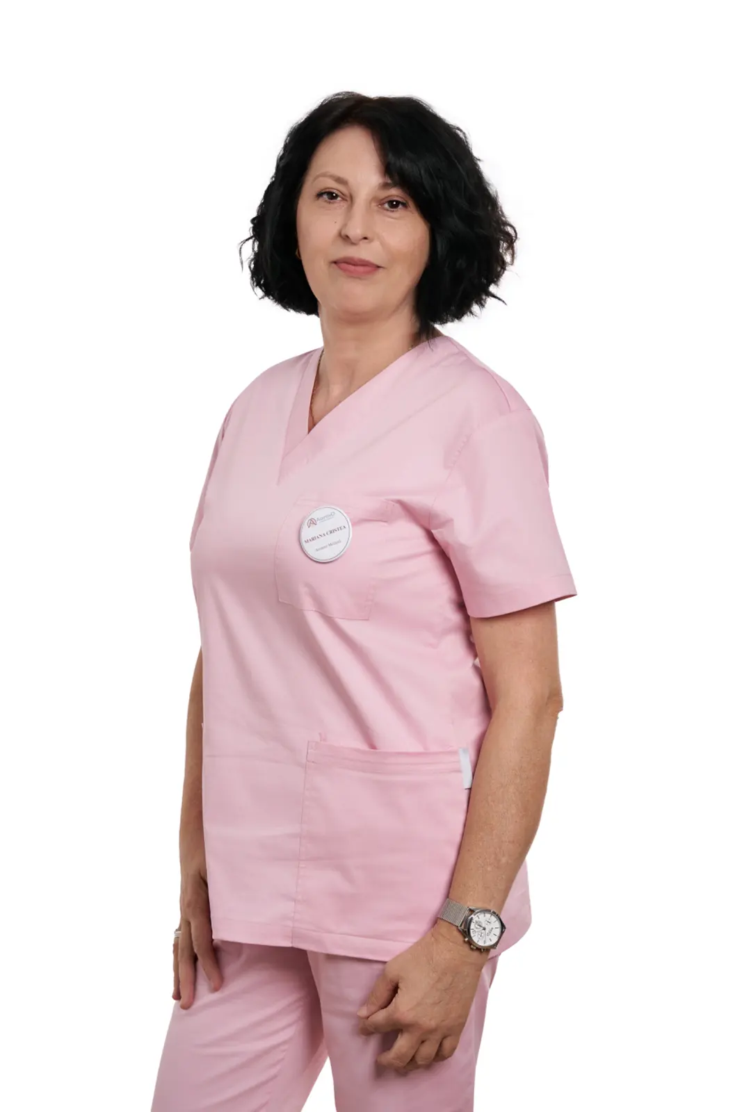 Asistentă medicală în uniformă roz, pozând profesional, AsertivO Otopeni